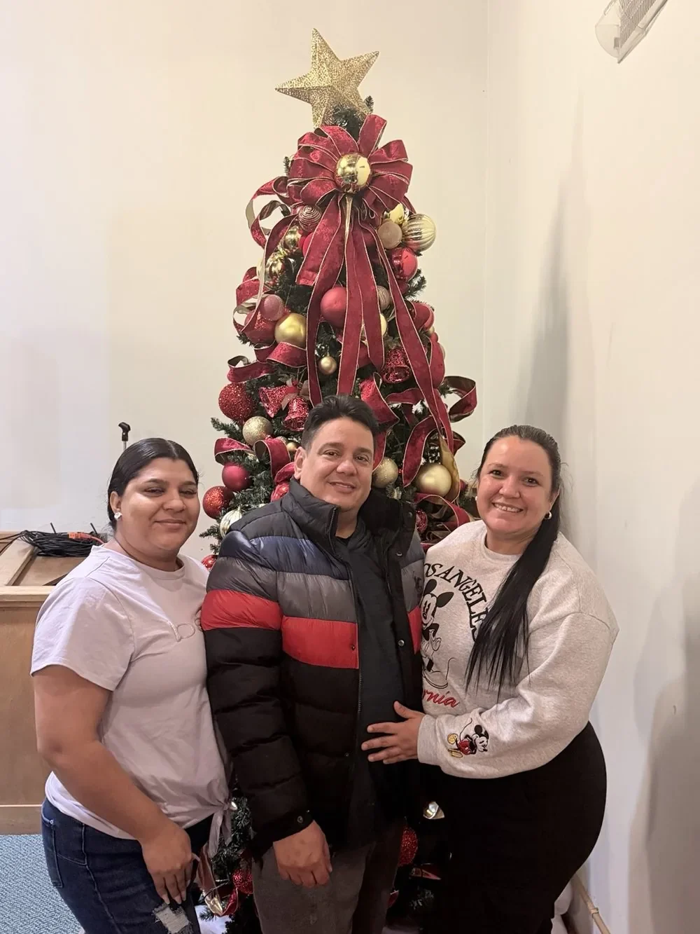 Community members sharing a Christmas moment.
